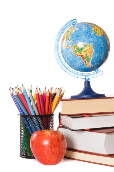 The globe on books isolated on a white background — Stock Photo, Image