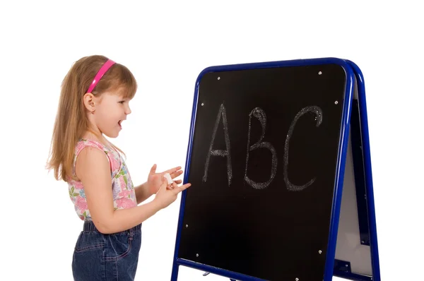 The little girl about a board — Stock Photo, Image