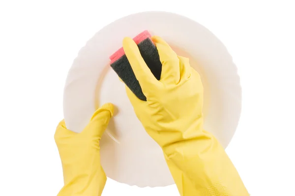 Die Hand im Handschuh wäscht einen Teller — Stockfoto