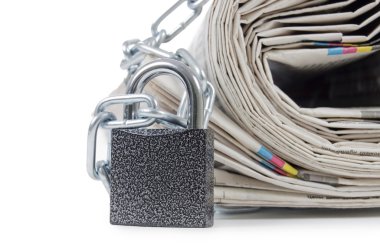 Pile of newspapers with chains clipart