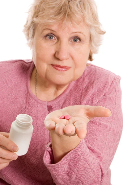La anciana con comprimidos — Foto de Stock