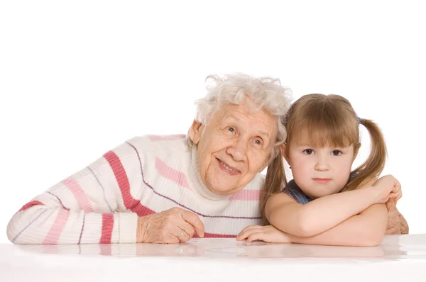 The elderly woman with the granddaughter — Stock Photo, Image