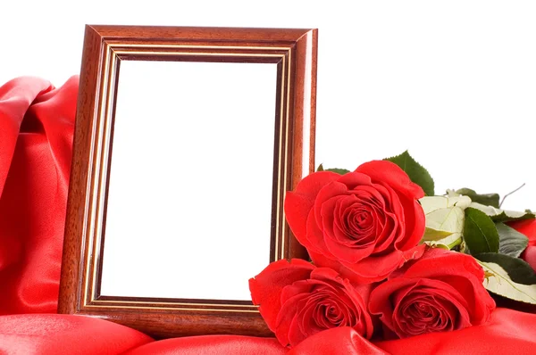 Красная роза с рамкой для фотографии — стоковое фото
