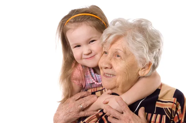 The elderly woman with grand daughter — Stock Photo, Image