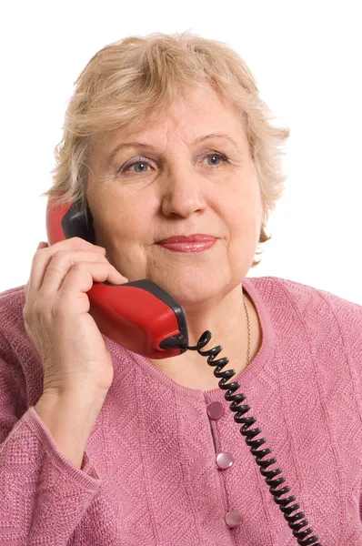 La femme âgée parle au téléphone — Photo