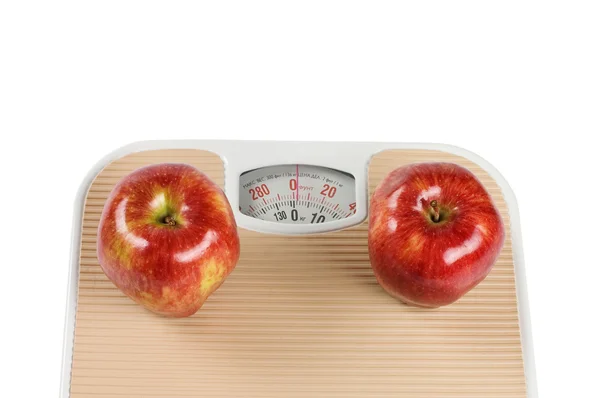 Scale and apple on white background — Stock Photo, Image