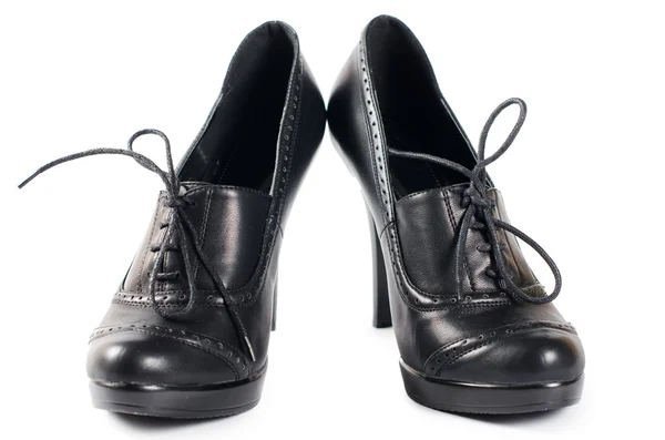 Sapatos femininos pretos isolados em branco — Fotografia de Stock