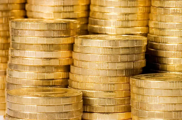 De gyllene mynt närbild bakgrund — Stockfoto