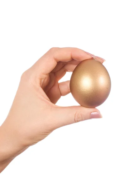 Zlaté vejce v ruce, izolované — Stock fotografie