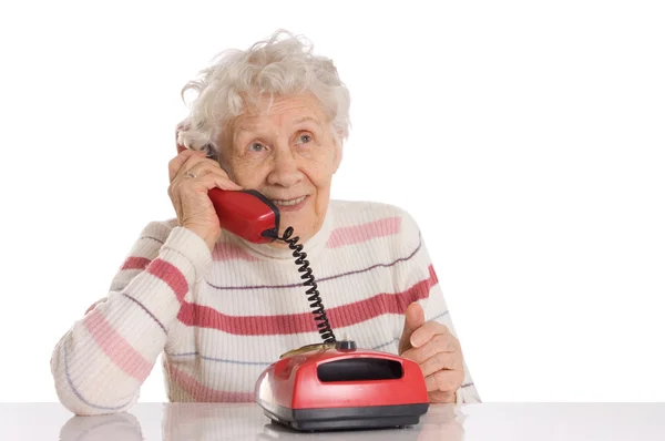 A mulher idosa fala por telefone — Fotografia de Stock