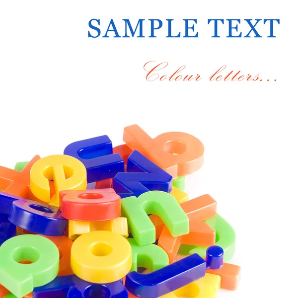 Letras inglesas de plástico aisladas en blanco — Foto de Stock