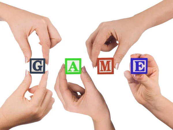 Χέρι και λέξη παιχνίδι που απομονώνονται σε λευκό — Φωτογραφία Αρχείου