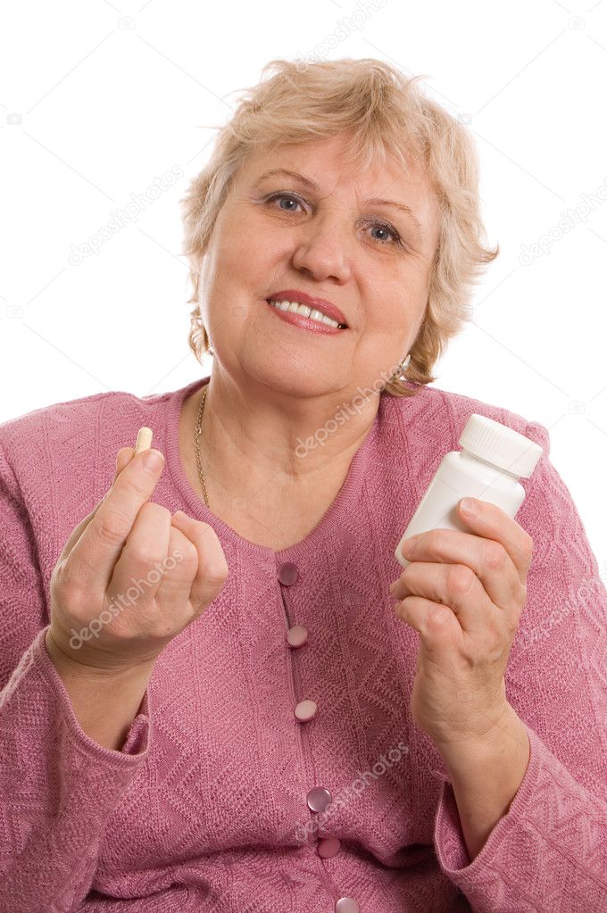 The elderly woman with tablets