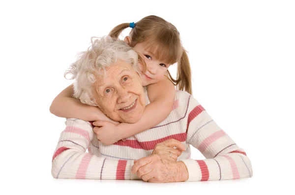 Elderly woman with the grand daughter — Stock Photo, Image