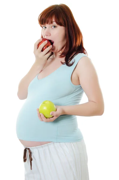La donna incinta con una mela — Foto Stock