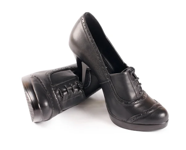 Чорне жіноче взуття ізольоване на білому — стокове фото