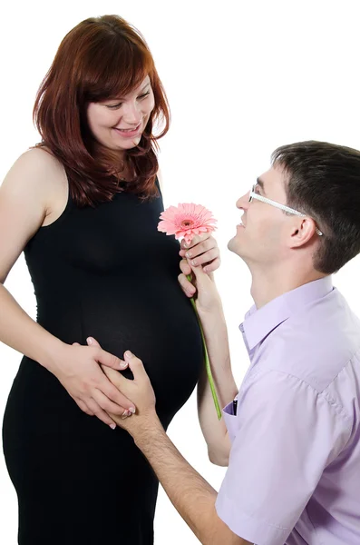 Mutlu hamile çift üzerinde beyaz izole Stok Fotoğraf