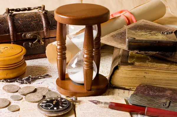 The hourglass and the book Stock Image