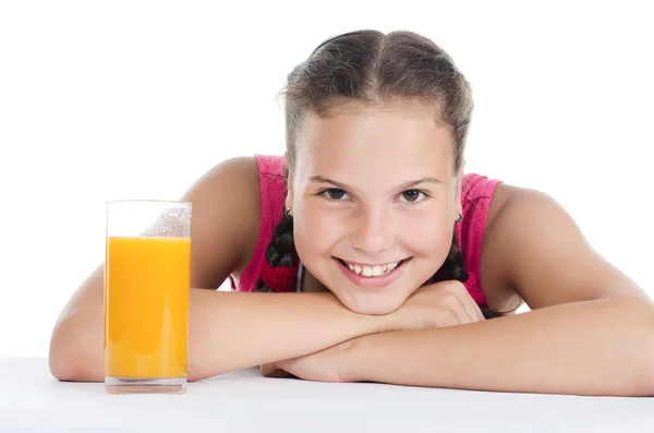 Young girl with a juice glass — Stock Photo, Image