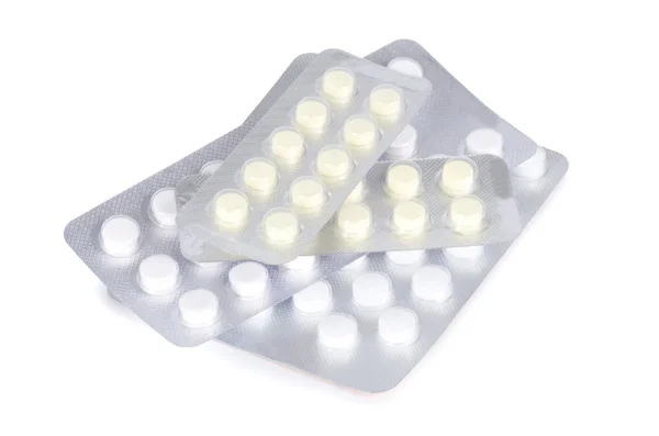 Paquetes de pastillas aisladas en blanco — Foto de Stock
