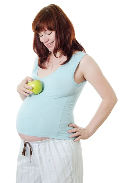 Gravid kvinna med ett äpple — Stockfoto