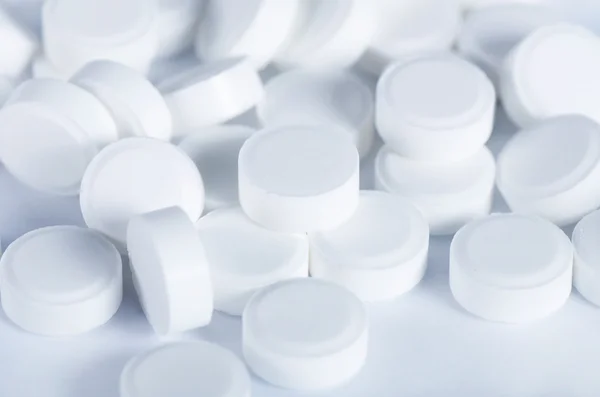 Vita tabletter - abstrakt medicinsk — Stockfoto