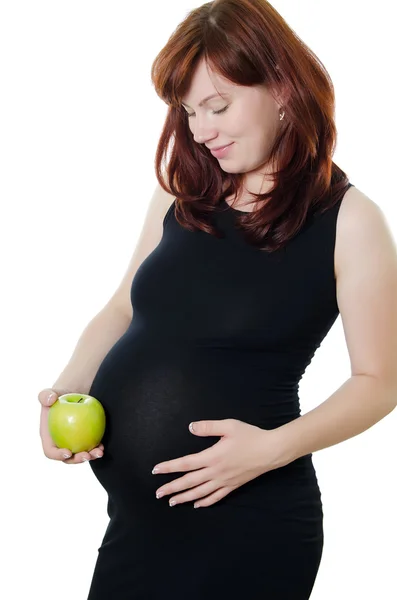 Η έγκυος γυναίκα με ένα μήλο — Φωτογραφία Αρχείου
