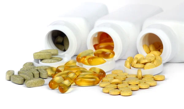 Tabletas pastillas y vitaminas — Foto de Stock