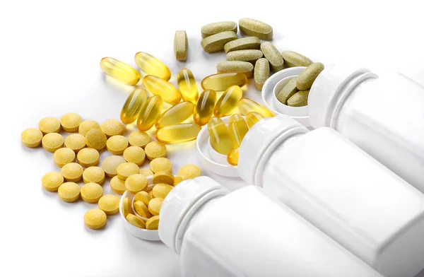 Comprimidos comprimidos e vitaminas — Fotografia de Stock