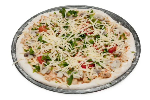 Неприготовленная вегетарианская пицца — стоковое фото