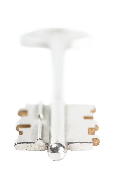 Key over white — Stock Photo, Image
