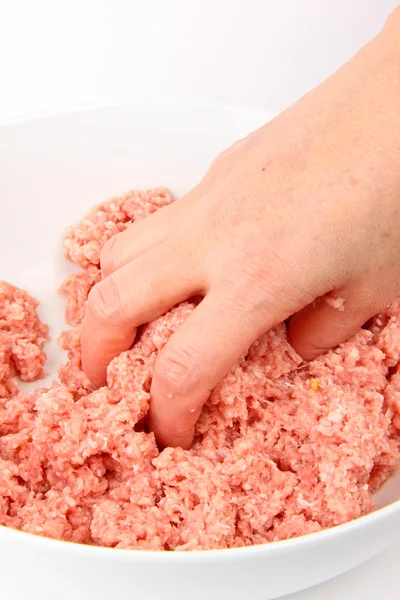 Hand working with minced meat — Stock Photo, Image