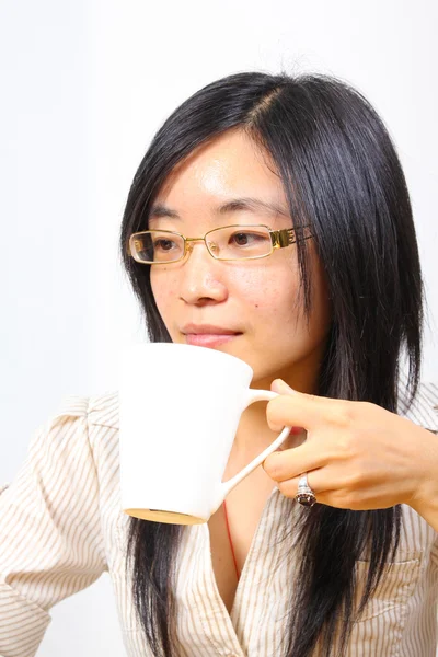 stock image Chinese businesswoman drinking coffee