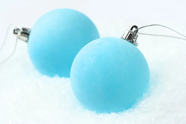Frosty blue Christmas baubles — Stock Photo, Image