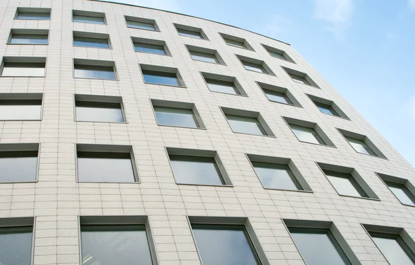 stock image Facade of modern building house over blue sky