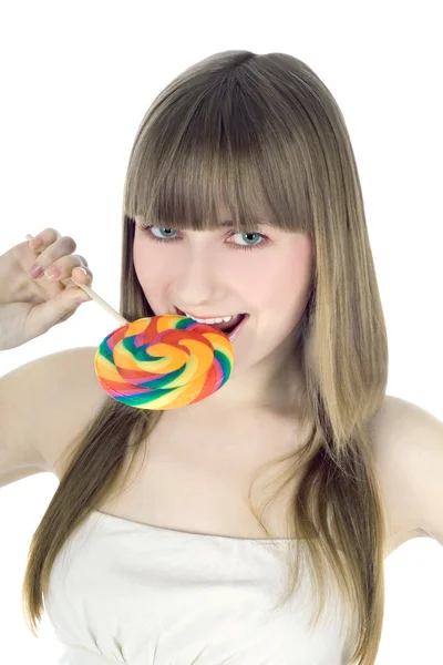 Bright picture of hungry blonde with color lollipop — Stock Photo, Image