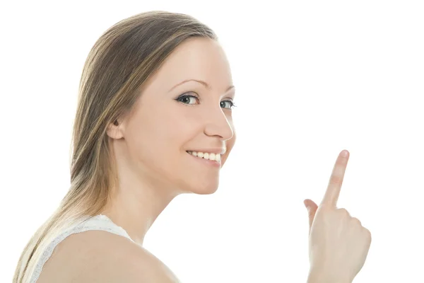 Яркая картина привлекательной женщины, указывающей пальцем — стоковое фото