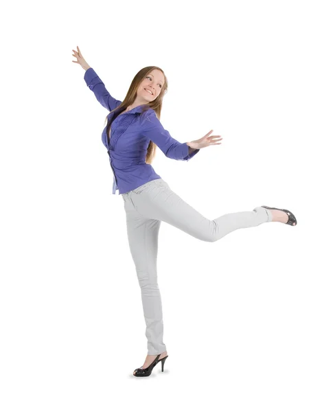 Jovem mulher feliz de pé contra fundo branco — Fotografia de Stock