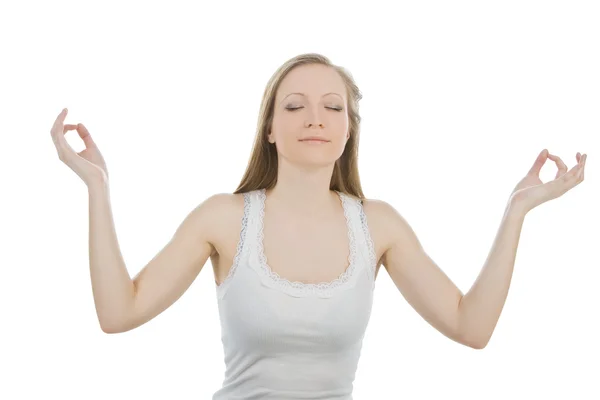 Porträtt av ganska ung kvinna gör yoga övning — Stockfoto