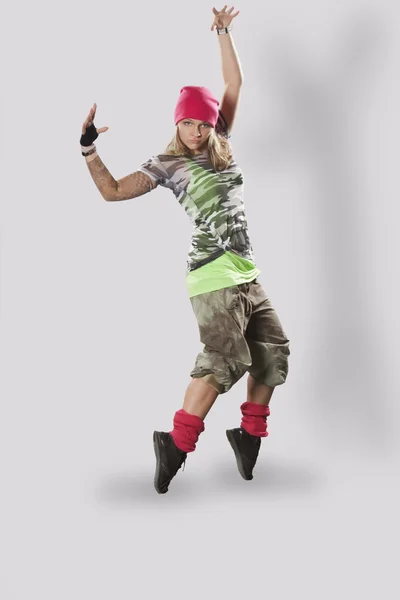 Teenage girl dancing breakdance in action — Stock Photo, Image