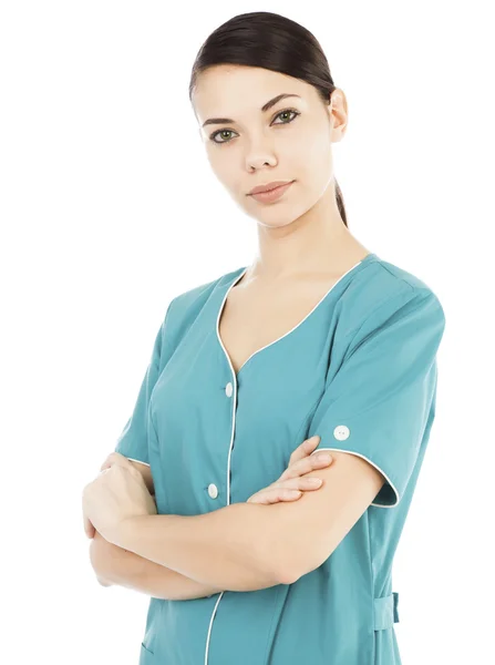 Porträt einer Ärztin, die vor weißem Hintergrund posiert — Stockfoto