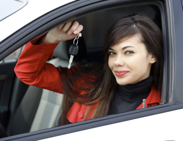 Beautiful young happy woman with car keys — Stock Photo, Image
