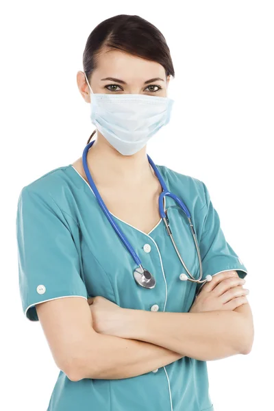 Portrét ženského lékaře v masce s stetoskop — Stock fotografie