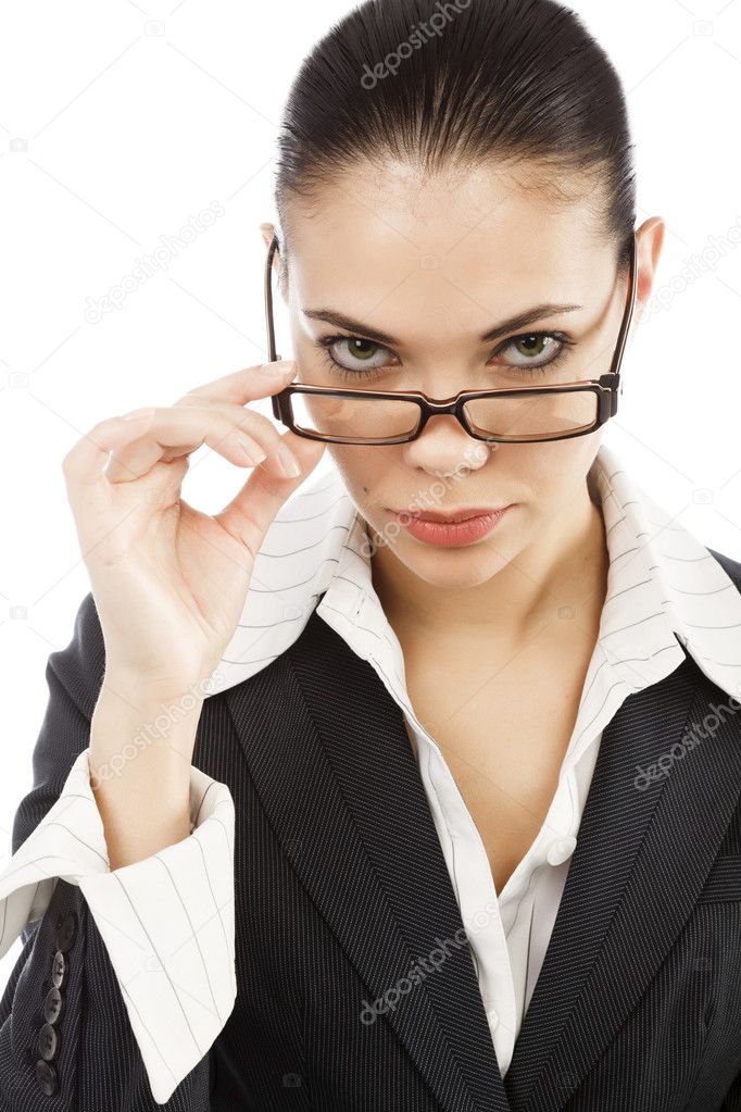 Portrait of young business woman holding her eye-glasses
