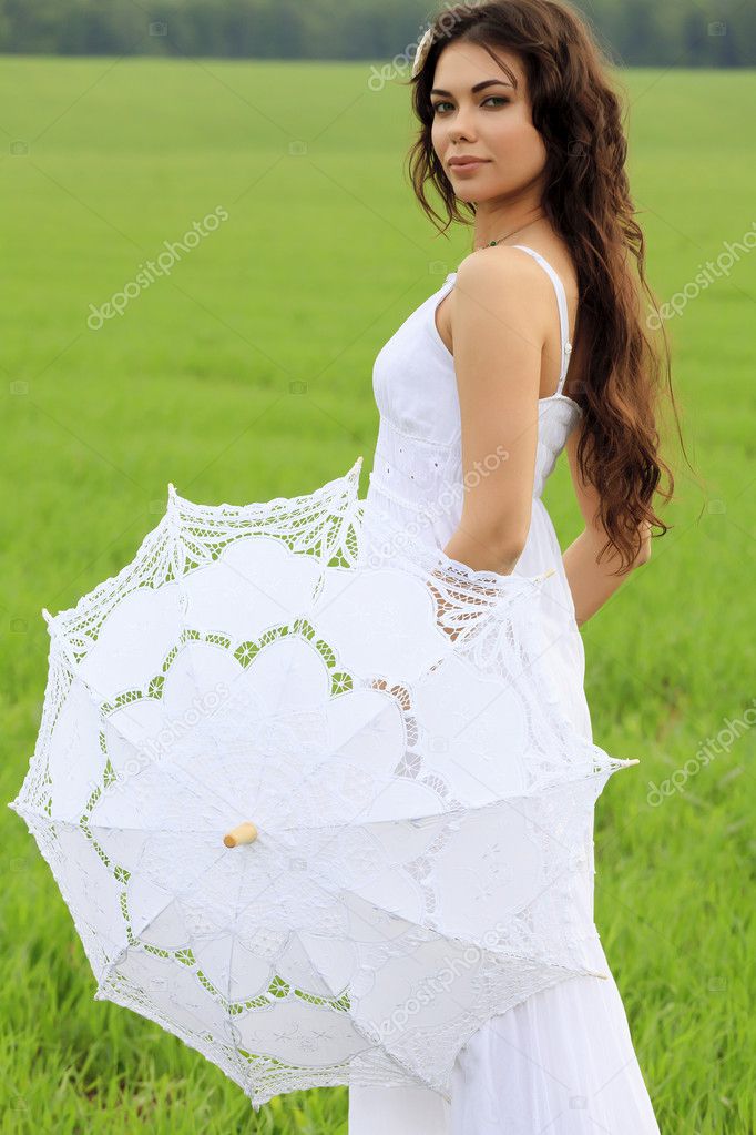 Beautiful bride posing outdoors