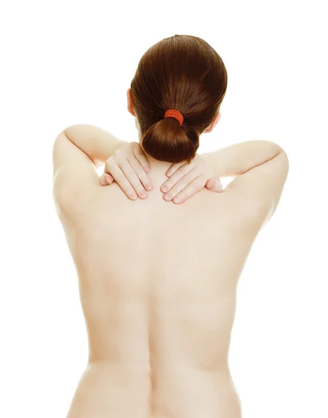 Остеохондроз - женщина массирует спину — стоковое фото