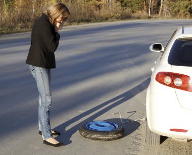 Woman with damaged car clipart