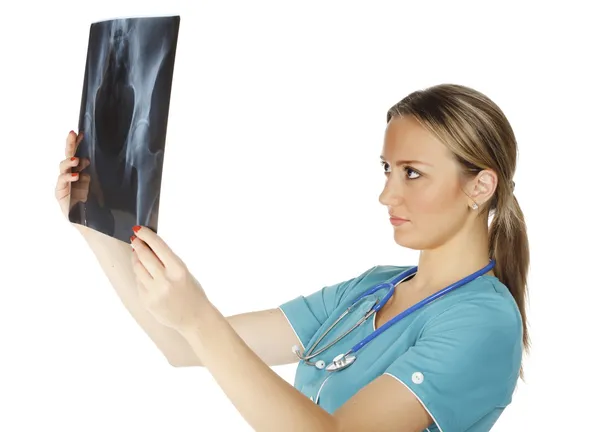 Γυναίκα γιατρό τον έλεγχο εικόνα xray, απομονώνονται σε λευκό φόντο. — Φωτογραφία Αρχείου