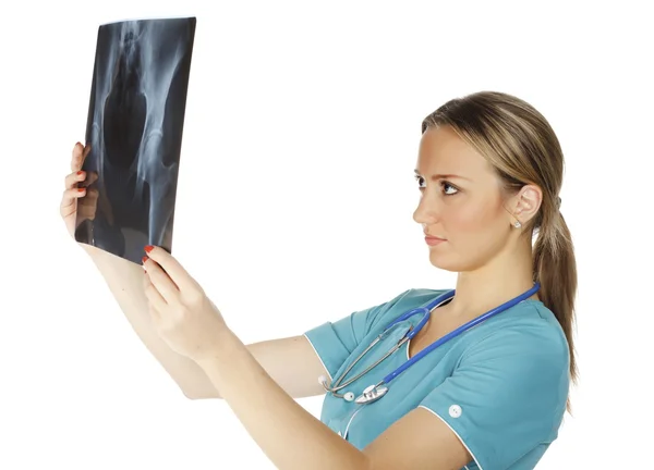 Ženský lékař, kontrola RTG obrazu, izolovaných na bílém pozadí. — Stock fotografie