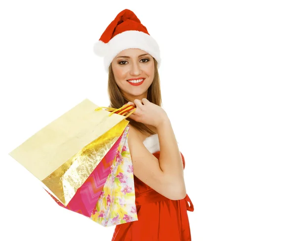 ショッピング クリスマスの女性は笑みを浮かべてします。白い背景の上の分離 — ストック写真